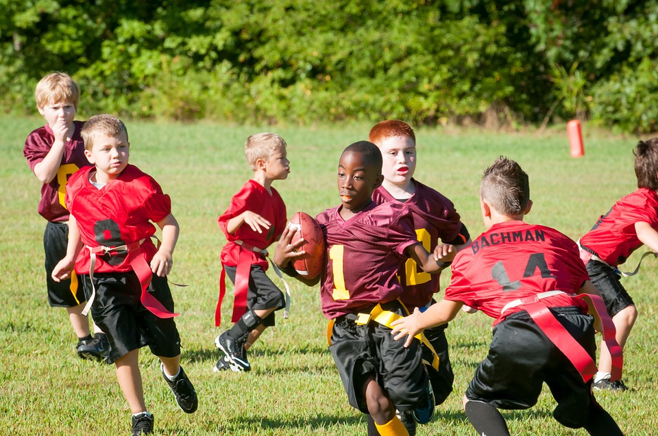 kids playing football