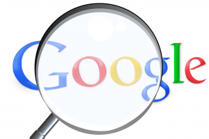 Google logo with a magnifying glass