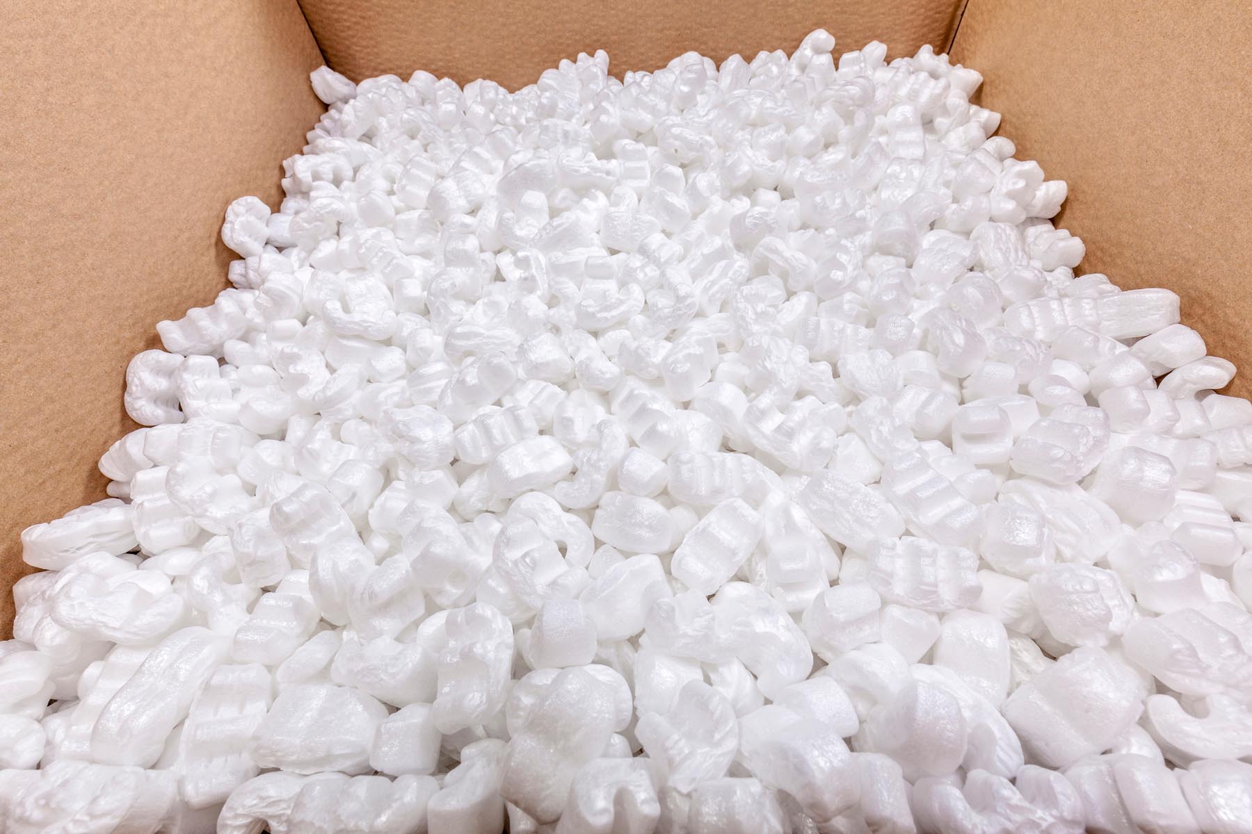 box packaging with polystyrene peanuts inside